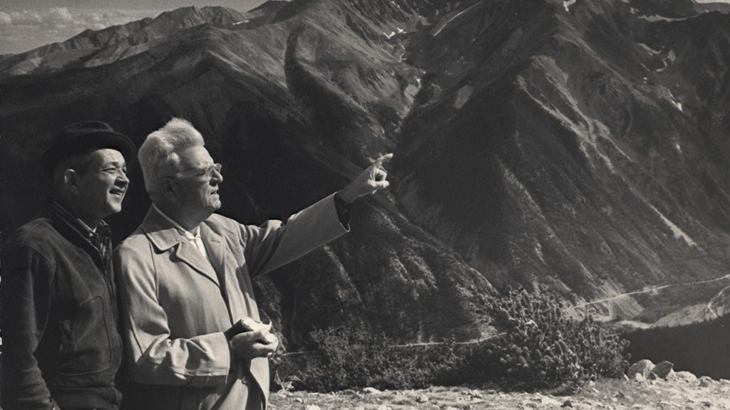 Standing on top of a mountain in the early days of Frontier Ranch
