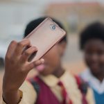 Kids taking a selfie in Africa