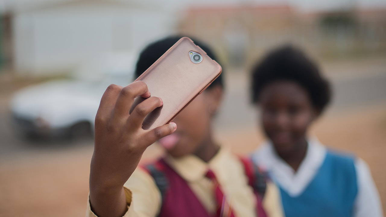 Kids taking a selfie in Africa