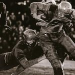 Stan Voth playing football