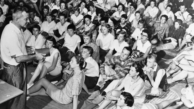 Jim Rayburn talking to kids