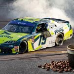 JD Gibbs Young Life racing car and cup of coffee