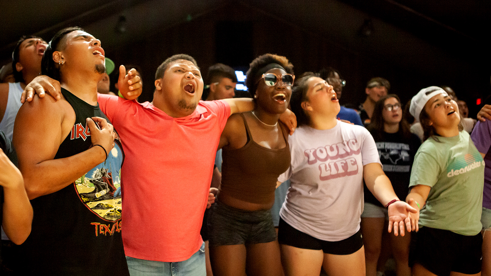 kids singing at a Young Life club event