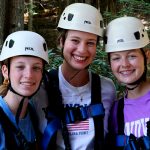 teens on a ropes course at a young life camp