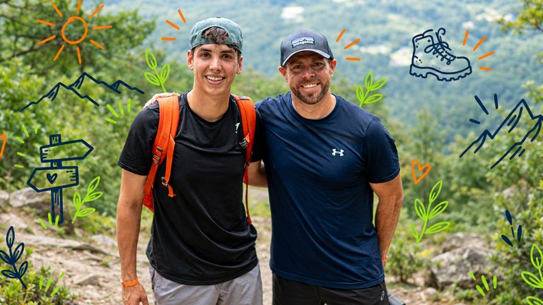 young life leader and teenager out for a hike
